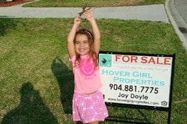 Little Girl in Front of For Sale Sign